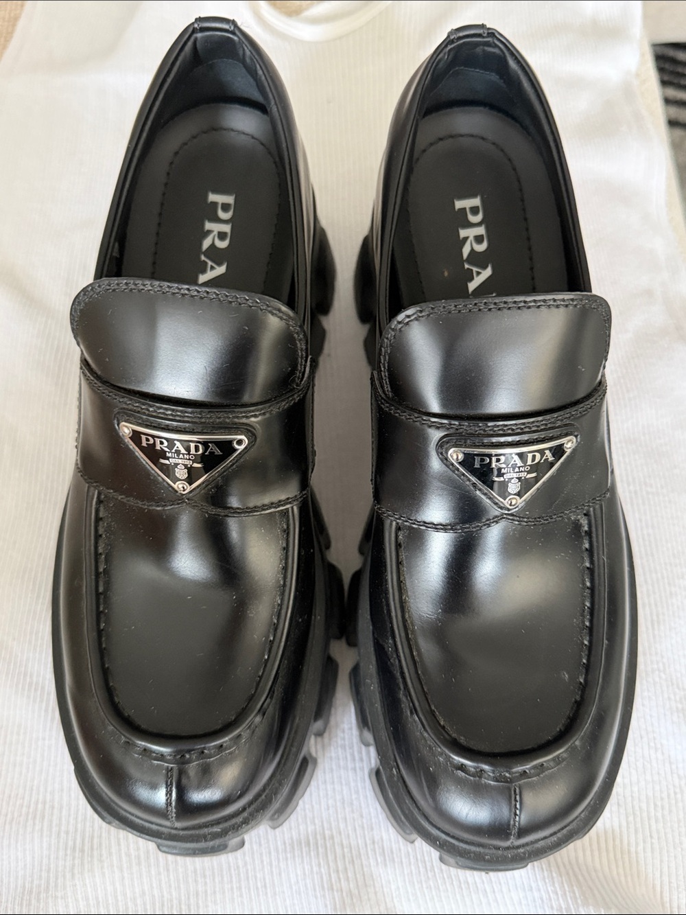 Prada Black Leather Lug Sole Penny Loafers with Triangular Logo